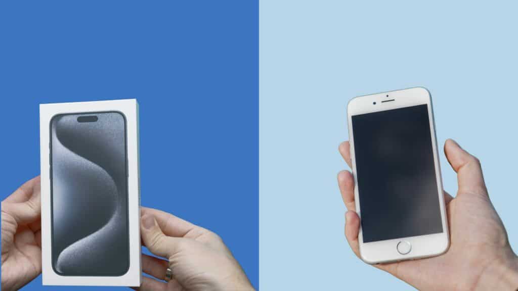 Customer comparing two refurbished phones on a table